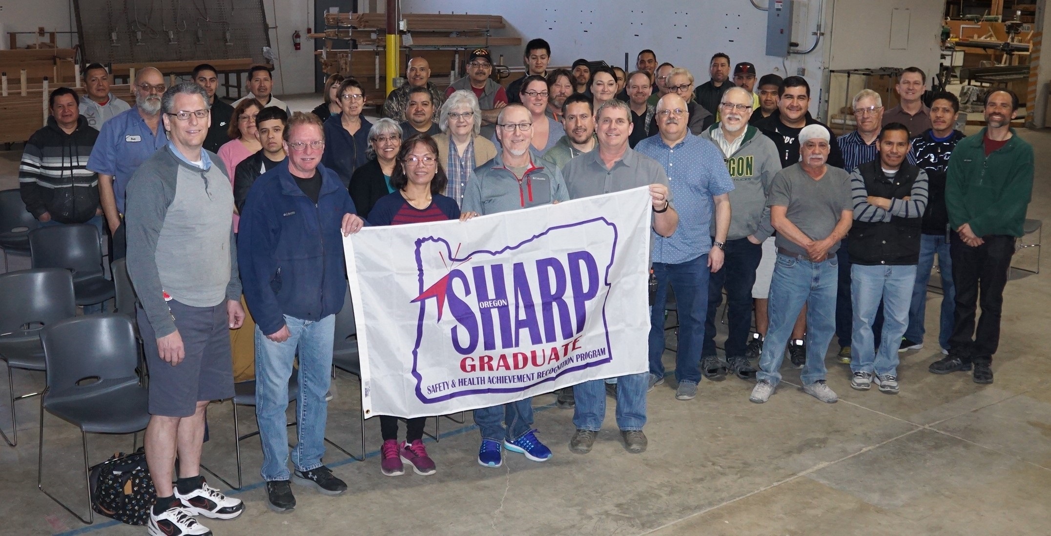 Employees of Woodfold Manufacturing, Inc., a SHARP Alliance Graduate